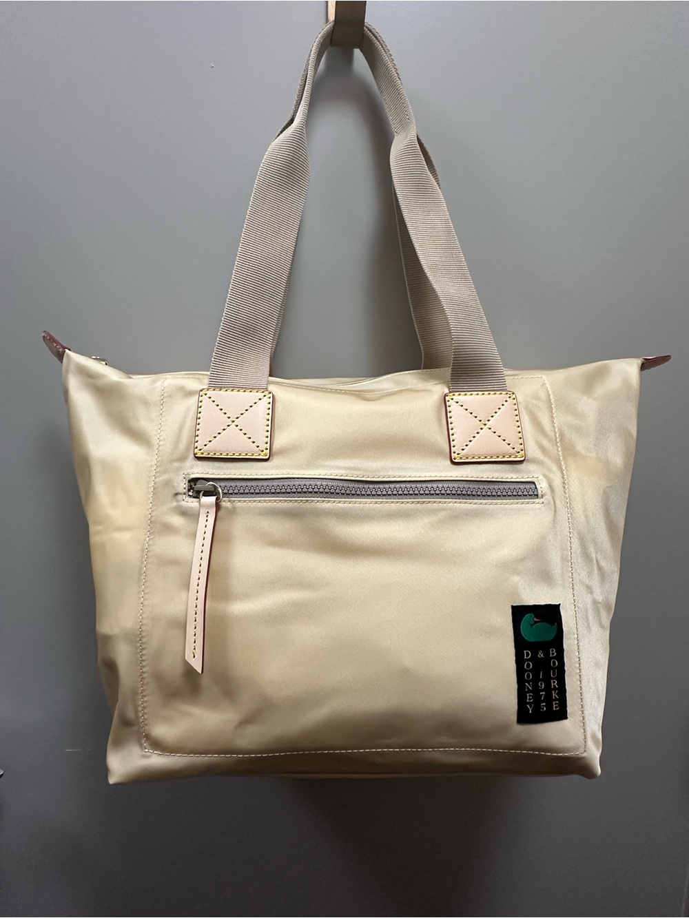 Dooney & Bourke Cream Nylon Tote with Front Zip Pocket